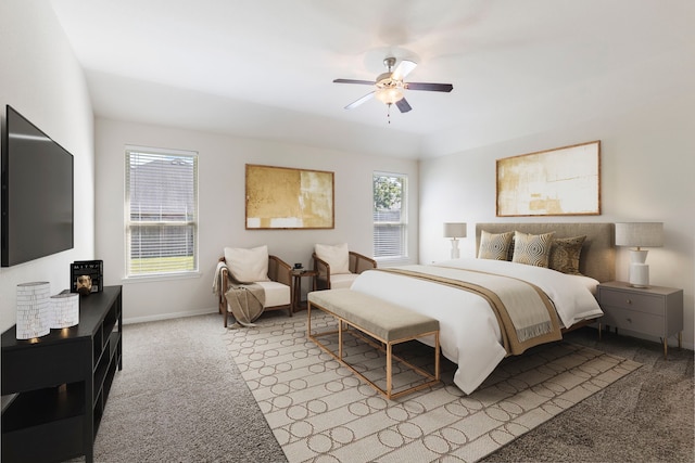 bedroom featuring light carpet and ceiling fan