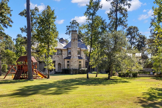 view of yard featuring a playground