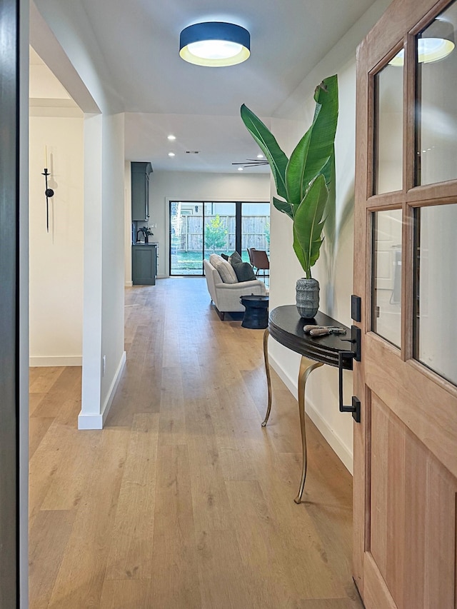 hallway featuring light wood-type flooring