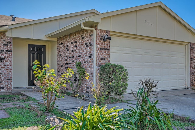 entrance to property featuring a garage