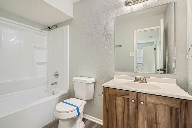 full bathroom featuring shower / bathtub combination, hardwood / wood-style flooring, vanity, and toilet