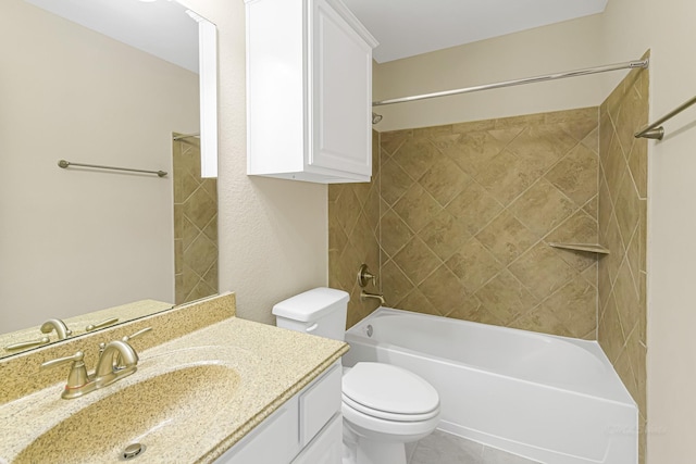 full bathroom featuring toilet, tiled shower / bath combo, and vanity