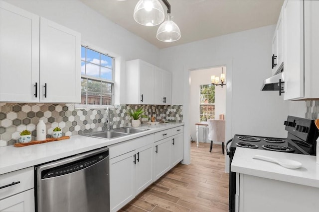 kitchen featuring white cabinets, stainless steel dishwasher, and black electric range oven