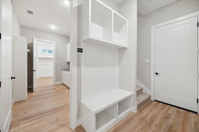 mudroom with light wood-type flooring