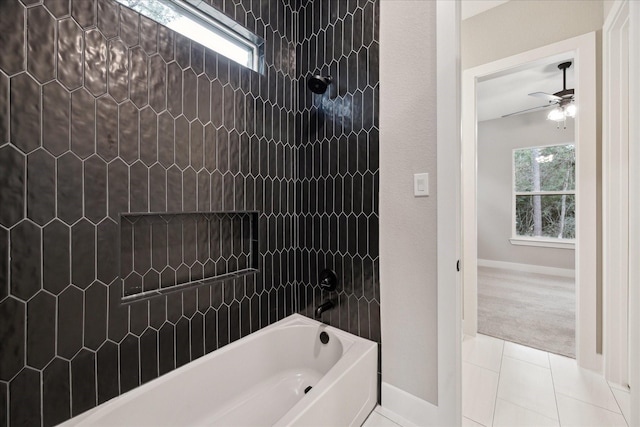 bathroom with shower / bathing tub combination, tile patterned flooring, a wealth of natural light, and ceiling fan