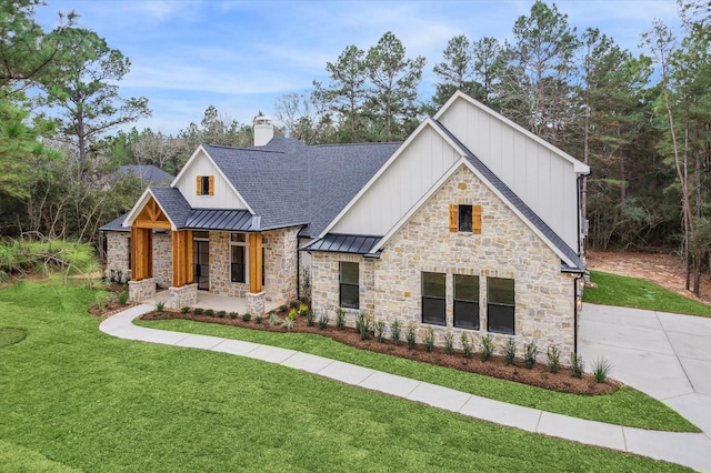 modern inspired farmhouse featuring a front yard and a porch