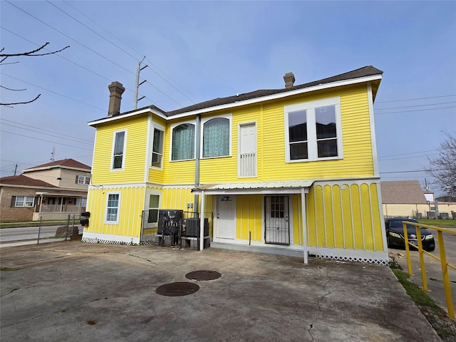 view of front facade with a patio area