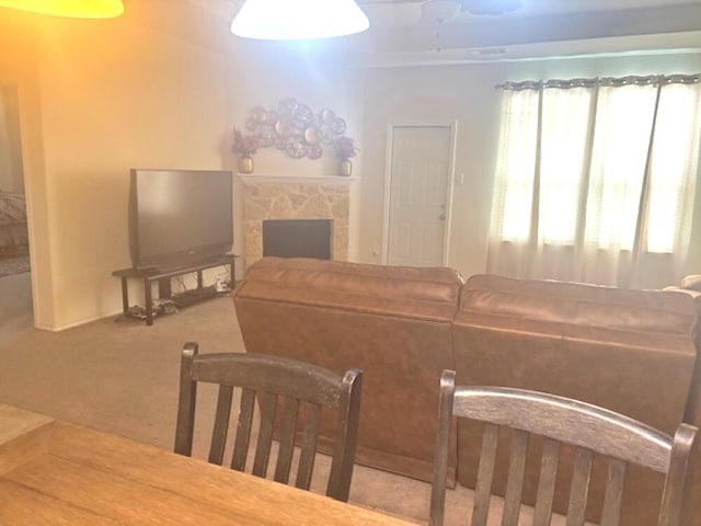 living room featuring a fireplace