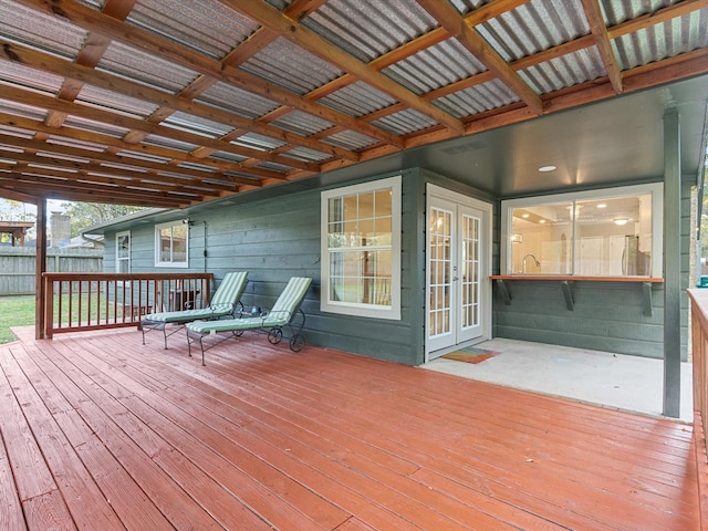 wooden terrace featuring french doors