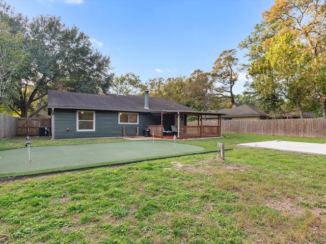 back of property with cooling unit and a patio area