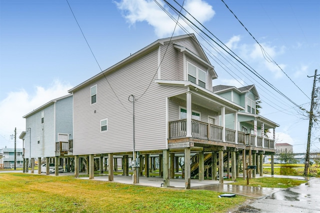 view of side of home featuring a lawn