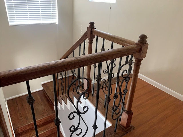 staircase featuring hardwood / wood-style floors