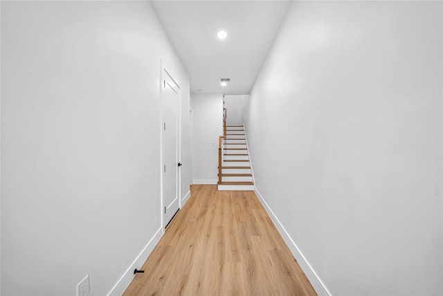 corridor featuring light hardwood / wood-style flooring