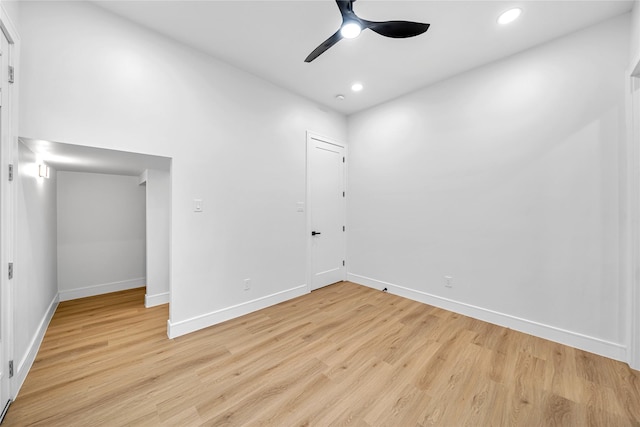 unfurnished room with ceiling fan and light hardwood / wood-style floors