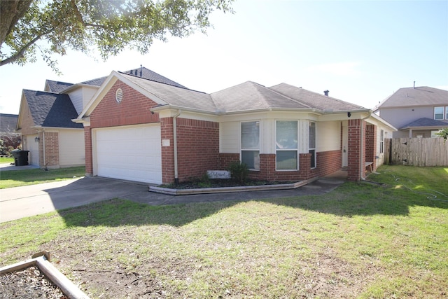 ranch-style home featuring a garage and a front lawn