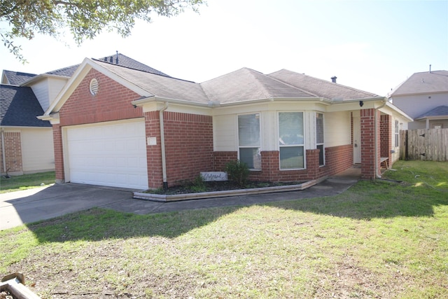 view of front facade featuring a garage and a front lawn