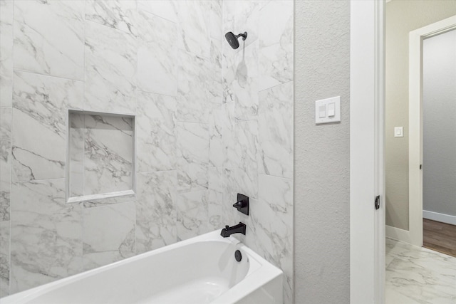 bathroom featuring shower / tub combination