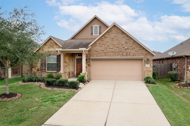 view of front of home featuring a garage and a front lawn