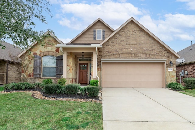 view of front of property with a garage and a front yard