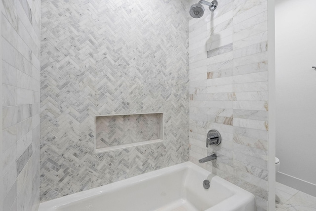 5658 Del Monte Dr, Houston, TX 77056 - full bath with baseboards, toilet, tub / shower combination, and marble finish flooring