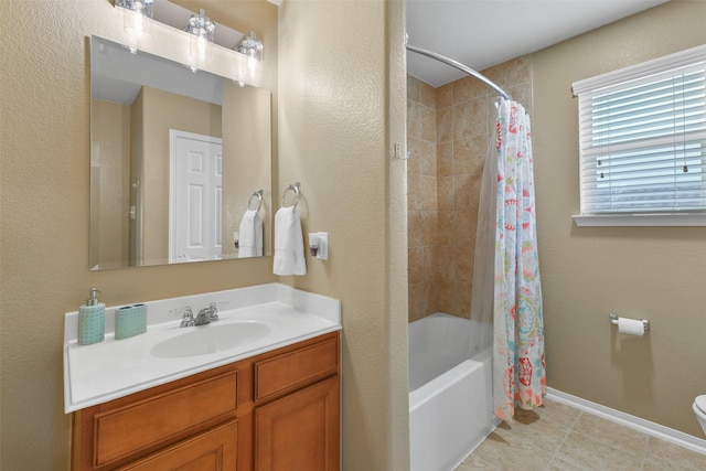 full bathroom with vanity, shower / tub combo with curtain, and toilet