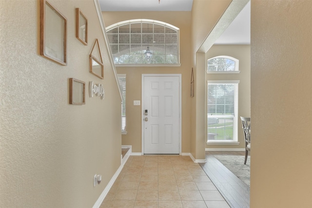 entrance foyer with light tile patterned floors