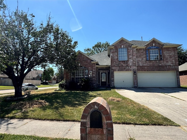 front facade featuring a front lawn and a garage