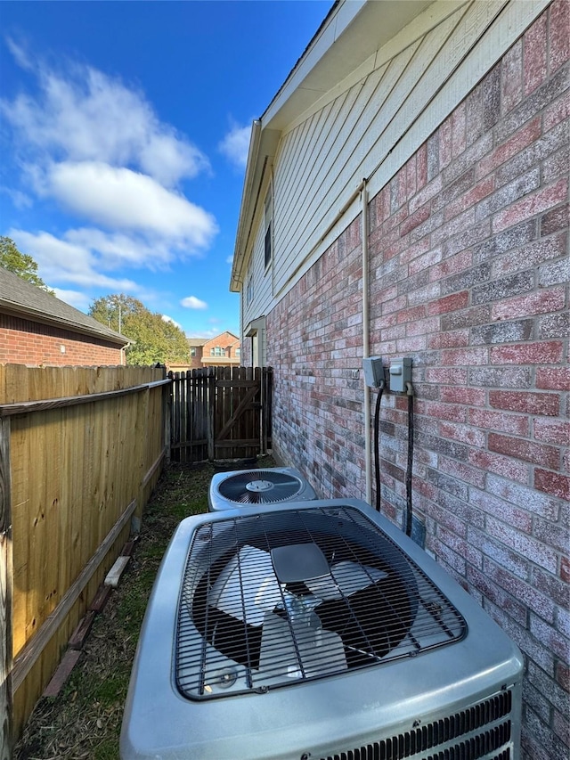 exterior space featuring central AC unit