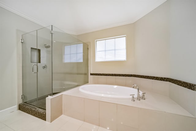 bathroom with tile patterned floors, crown molding, and separate shower and tub