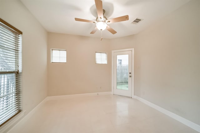 empty room featuring ceiling fan