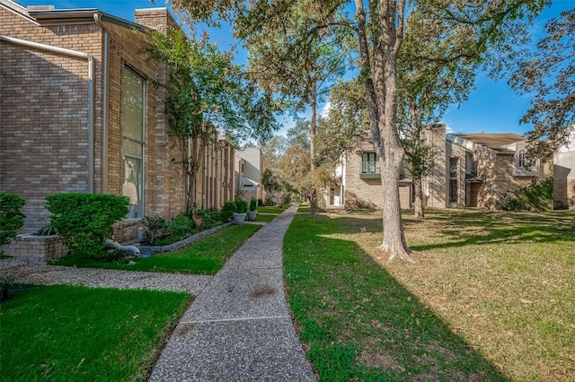 surrounding community featuring a lawn