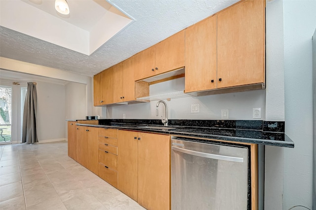 kitchen featuring sink, a textured ceiling, dishwasher, and dark stone counters