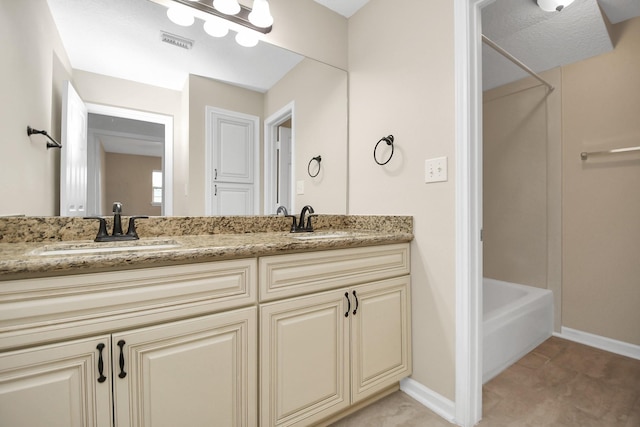 bathroom with shower / washtub combination and vanity