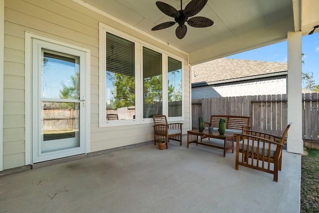 view of patio featuring an outdoor hangout area and ceiling fan