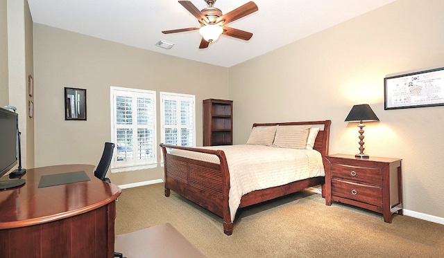 bedroom with light carpet and ceiling fan