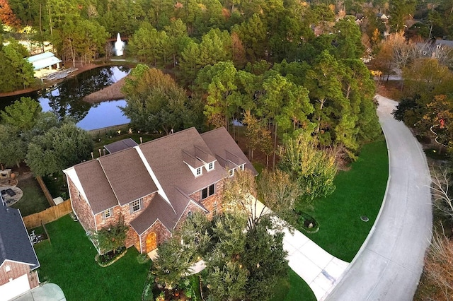 drone / aerial view with a water view