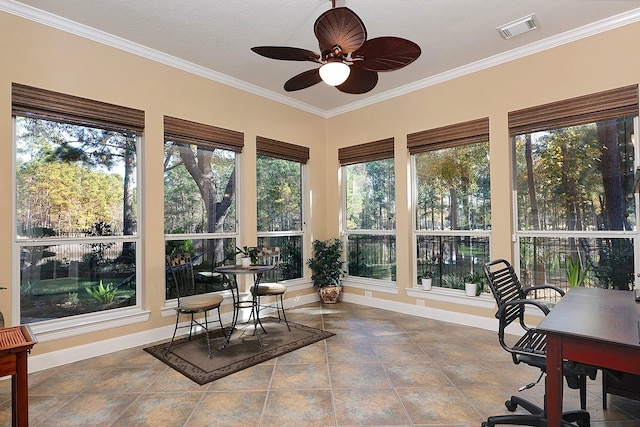 sunroom with ceiling fan