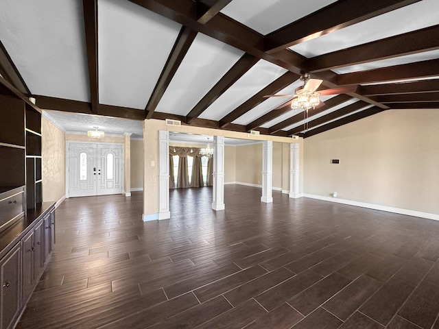 unfurnished living room featuring ceiling fan, vaulted ceiling with beams, and ornate columns