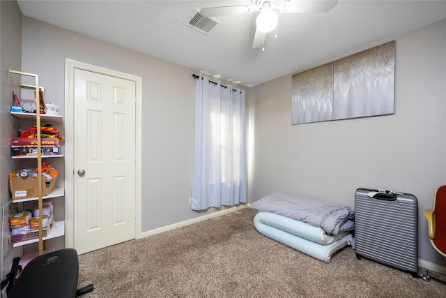 carpeted bedroom with ceiling fan