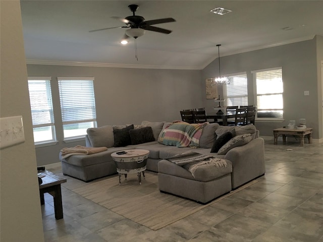 living room featuring vaulted ceiling, plenty of natural light, ornamental molding, and ceiling fan with notable chandelier