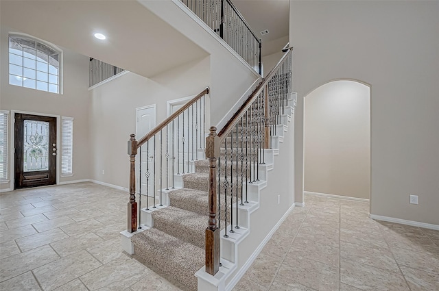 entryway featuring a high ceiling