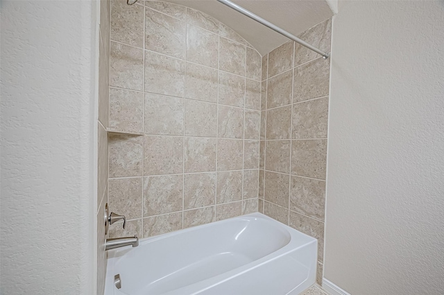 bathroom with shower / washtub combination