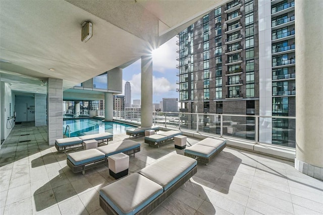 view of patio featuring a community pool