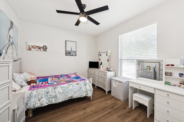 bedroom featuring ceiling fan and dark hardwood / wood-style floors