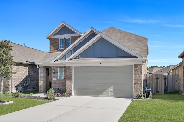 view of front facade with a garage and a front yard