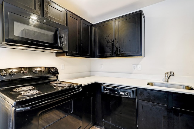 kitchen featuring sink and black appliances