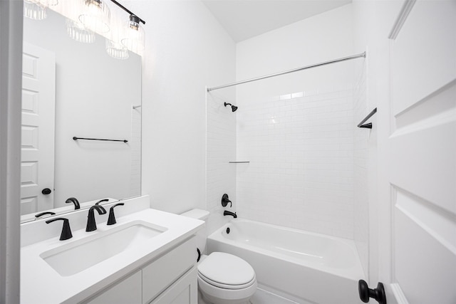 full bathroom featuring shower / washtub combination, vanity, and toilet