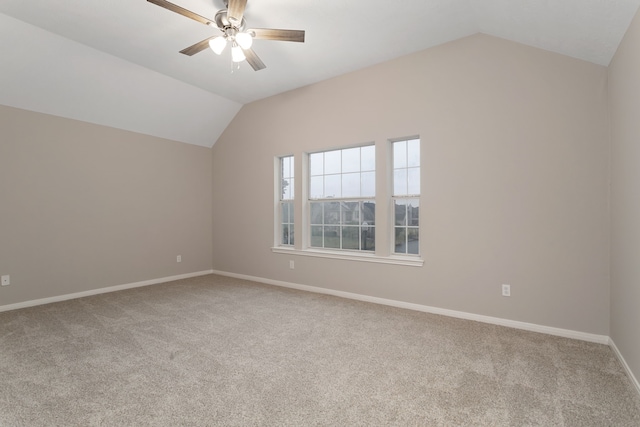 bonus room with ceiling fan, light carpet, and lofted ceiling