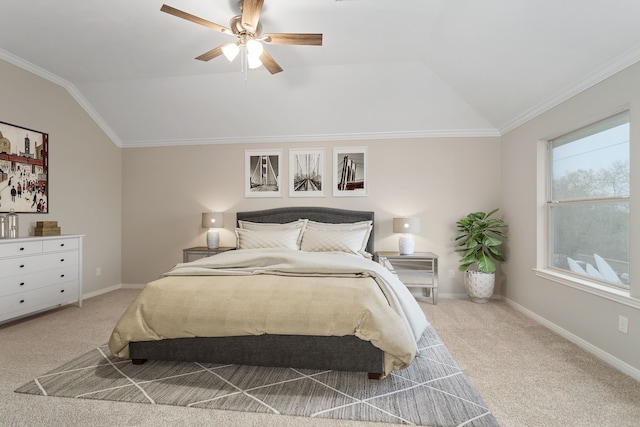 bedroom with carpet, ceiling fan, and vaulted ceiling