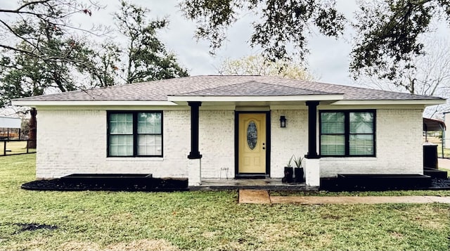 view of front of home with a front yard